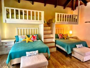 Postel nebo postele na pokoji v ubytování Srvittinivillas Brroe-27 Casa de Campo Resorts Villas Espacius - Modern Great