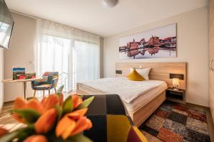 Ένα ή περισσότερα κρεβάτια σε δωμάτιο στο Hotel Müllers-Weiden