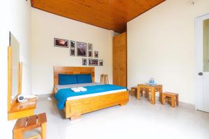Postel nebo postele na pokoji v ubytování Gia Pham Hotel