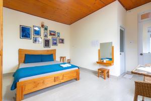 Postel nebo postele na pokoji v ubytování Gia Pham Hotel