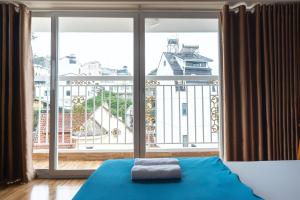 Postel nebo postele na pokoji v ubytování Gia Pham Hotel