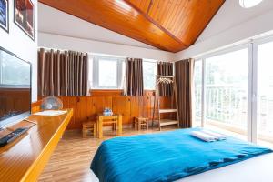 Postel nebo postele na pokoji v ubytování Gia Pham Hotel