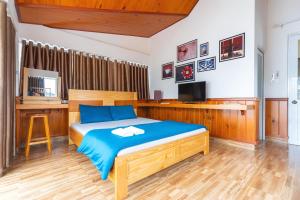 Katil atau katil-katil dalam bilik di Gia Pham Hotel