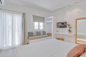 Postel nebo postele na pokoji v ubytování Nautica suites - Grand Suite with jacuzzi