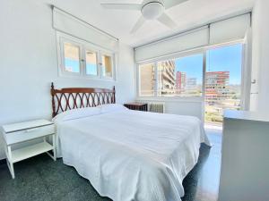 En eller flere senge i et værelse på Akra primera línea de Playa Vistas Increibles !!