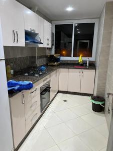 A kitchen or kitchenette at CASA SANYA RMEL Tetouane
