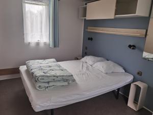 Postel nebo postele na pokoji v ubytování Camping Kersioual