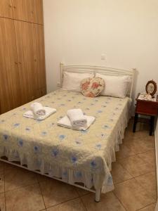 Posteľ alebo postele v izbe v ubytovaní AGKYRA Rooms (Love)