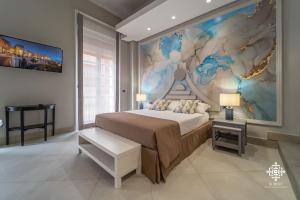Ein Bett oder Betten in einem Zimmer der Unterkunft Matteotti Luxury Residence