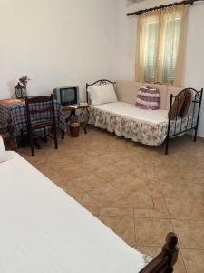 Posteľ alebo postele v izbe v ubytovaní AGKYRA Rooms (Love)