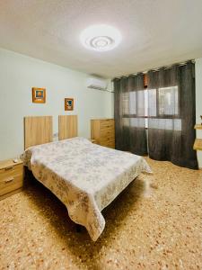 Posteľ alebo postele v izbe v ubytovaní Аpartment Agost + 6 fotografií