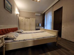 Ένα ή περισσότερα κρεβάτια σε δωμάτιο στο Archie's Apartment in Old Town