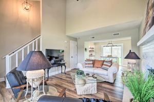 a living room with a couch and a table at Stunning Townhome about 5 Mi to Dtwn Columbia! in Columbia