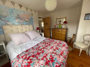 מיטה או מיטות בחדר ב-Ladyurd Farmhouse