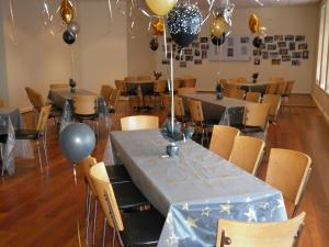 a dining room with tables with balloons on them at New Whyalla Hotel in Whyalla