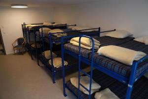Voodi või voodid majutusasutuse L'auberge de Noiraigue toas