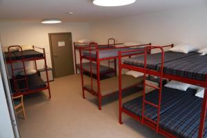 Voodi või voodid majutusasutuse L'auberge de Noiraigue toas