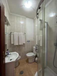 Een badkamer bij Alojamento Por do Sol