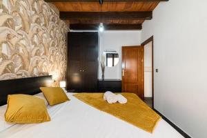 Postel nebo postele na pokoji v ubytování Apartamentos Afán de Ribera