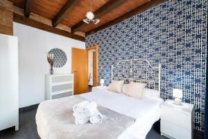 Postel nebo postele na pokoji v ubytování Apartamentos Afán de Ribera