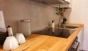 A kitchen or kitchenette at ALmare - Nice & Easy