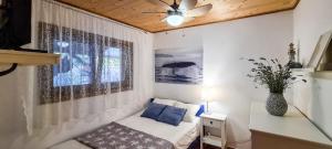 a small room with a couch and a window at Holiday home Smokvin Hlad in Peroj +37 photos