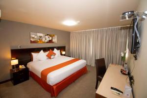 Postelja oz. postelje v sobi nastanitve SM Hotel