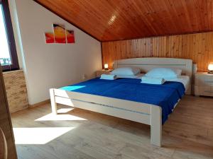 Postel nebo postele na pokoji v ubytování Pansion Klaudija