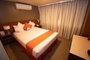 Postelja oz. postelje v sobi nastanitve SM Hotel