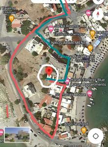 a map of a road with a red at Jaana & Akis Holiday Home 1&2, Haraki in Haraki
