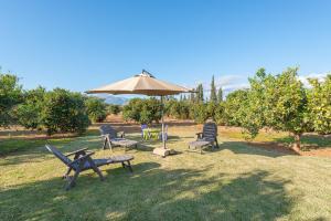 A garden outside Can Rafelino, pool and relax