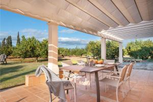 A garden outside Can Rafelino, pool and relax