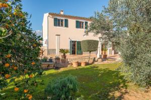 A garden outside Can Rafelino, pool and relax