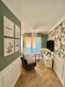 Telewizja i/lub zestaw kina domowego w obiekcie «La Petite Escapade à Deauville» PLACE MORNY
