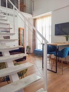 TV a/nebo společenská místnost v ubytování Expoholidays - Plaza Vieja con PARKING gratis