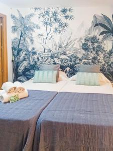 Posteľ alebo postele v izbe v ubytovaní Expoholidays - Plaza Vieja con PARKING gratis
