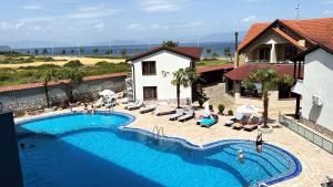 an overhead view of a swimming pool in a resort at Hotel Lyhnidas in Pogradec