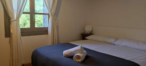 Postel nebo postele na pokoji v ubytování Antigua Casa Chato - tucasaenlospirineos