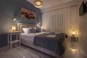 Postel nebo postele na pokoji v ubytování Maya apartments Hanioti