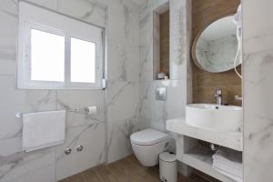 Koupelna v ubytování Maya apartments Hanioti