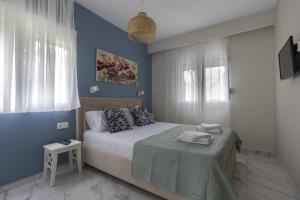 Postel nebo postele na pokoji v ubytování Maya apartments Hanioti