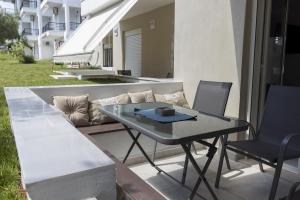 Posezení v ubytování Maya apartments Hanioti