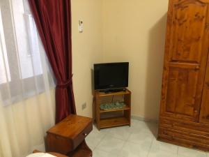 Télévision ou salle de divertissement dans l'établissement VILLA PEPETO Durres Albania