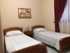 Un ou plusieurs lits dans un hébergement de l'établissement VILLA PEPETO Durres Albania