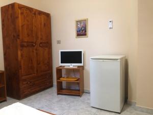 Télévision ou salle de divertissement dans l'établissement VILLA PEPETO Durres Albania