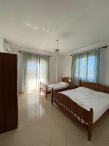 Postel nebo postele na pokoji v ubytování "Adriatik Hills" Apartments COMPLEX