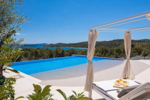 a view of a swimming pool from a villa at Villa Pirata in Jezera