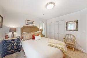 מיטה או מיטות בחדר ב-Park Ave Manor 3B
