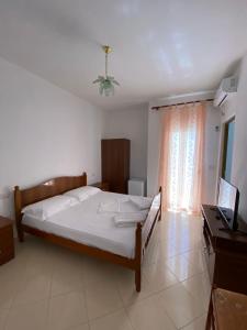 Un pat sau paturi într-o cameră la "Adriatik Hills" Apartments COMPLEX