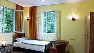 Letto o letti in una camera di GUEST HOUSE RIMAS HOME